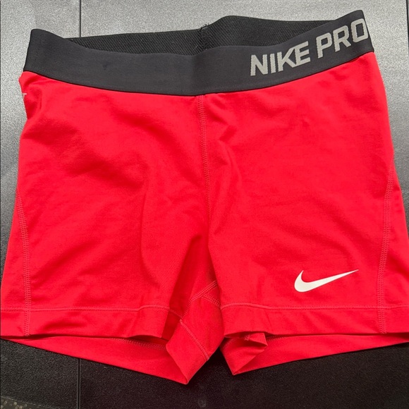 Nike Pro Red Shorts with Black Waistband - Picture 1 of 2